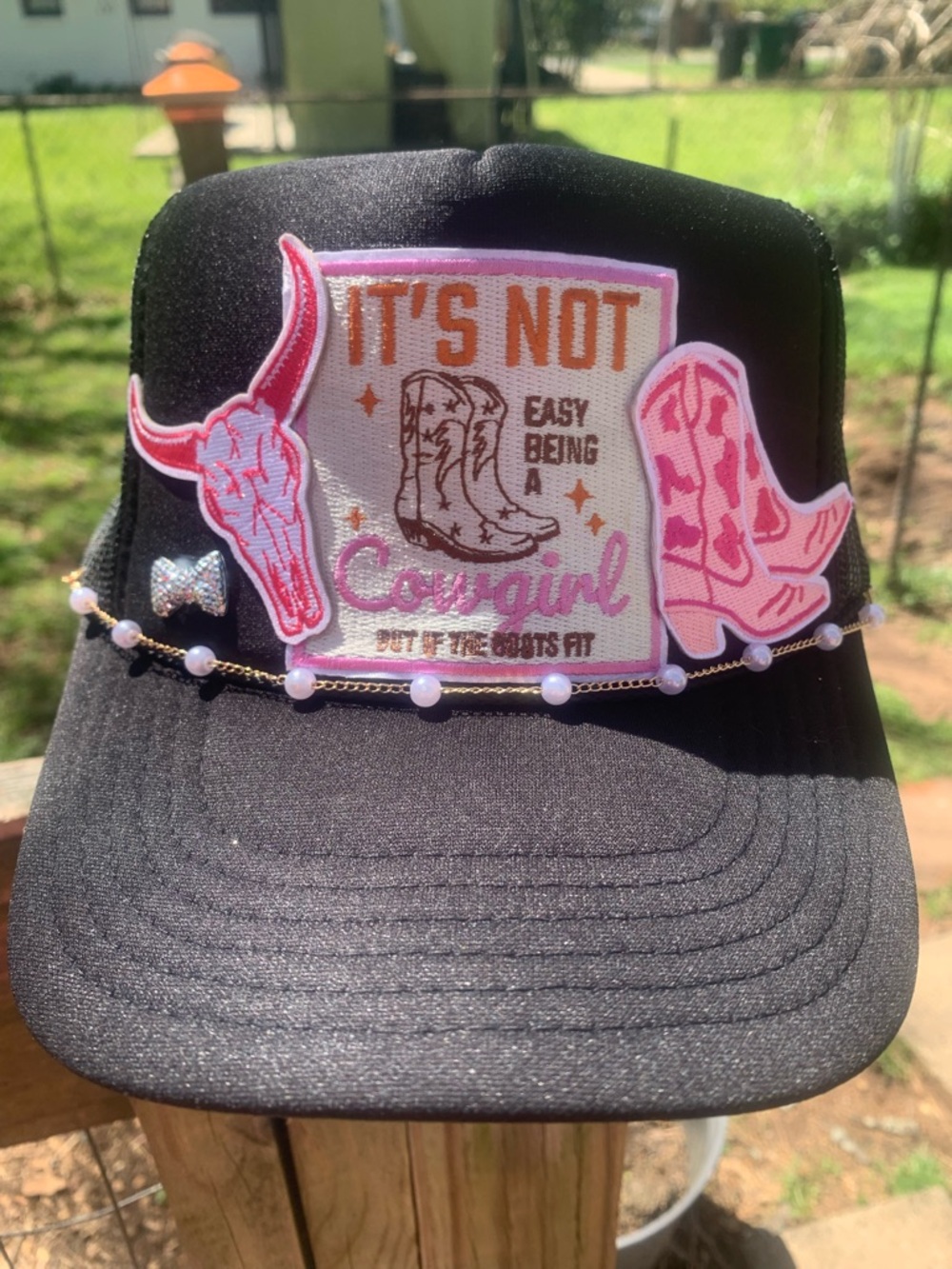 Black Trucker Hat with Pink Cowgirl Patch